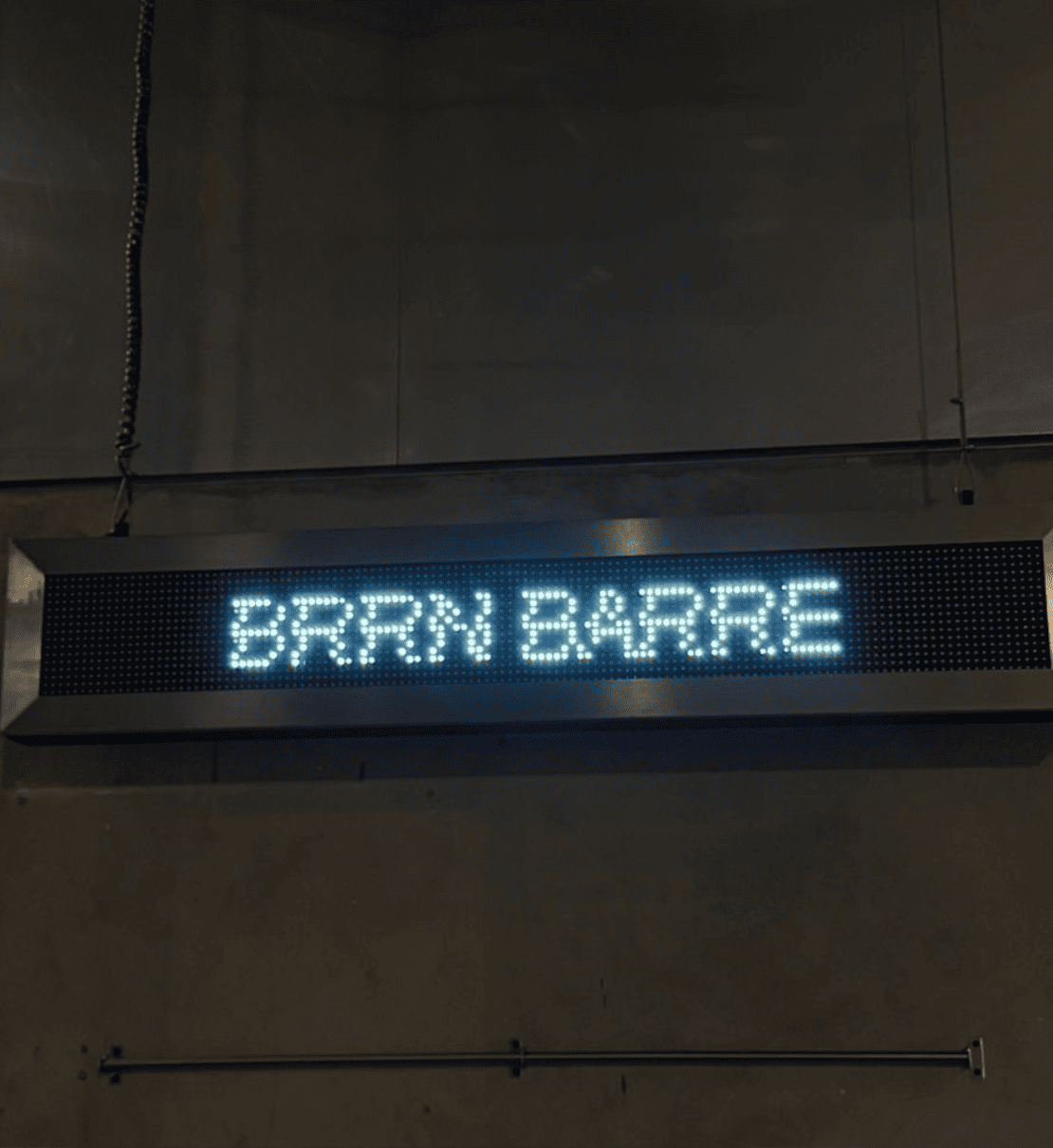 Illuminated BRRN BARRE studio sign
